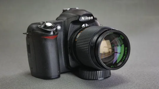 Купити Nikon F светосильный телеобъектив Quantaray (sigma) 135mm/2,8 Ф52mm Вживане