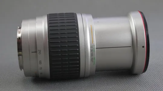 Об&#039;єктив Sony Alpha / Minolta AF зум объектив Promaster Spectrum 7 28-210mm f/4.2-6.5 MC Ф67mm Вживане Недорого