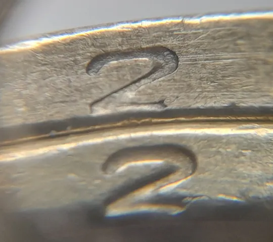 Купити (1894да) 1 гривня 2006 різновиди викрошок у цифрі '2' слова "2006" на гурті (гурти різні) - 2 монети одним лотом (1 гривна 2006 брак)