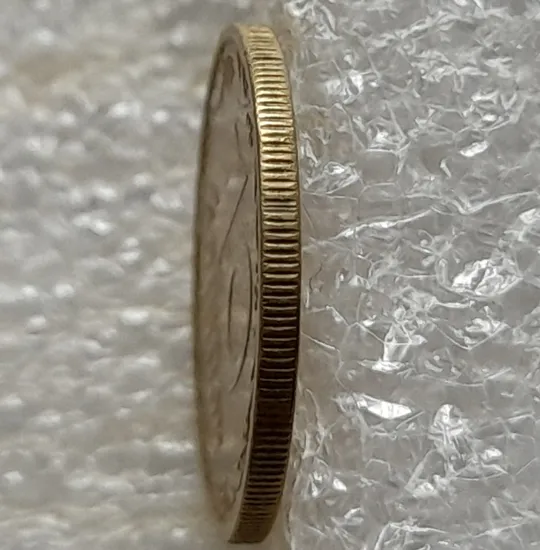 (2035) 10 копійок 2002 брак гуртильного кільця на 12 год.(10 копеек 2002 брак гуртильного кольца) З аукціону