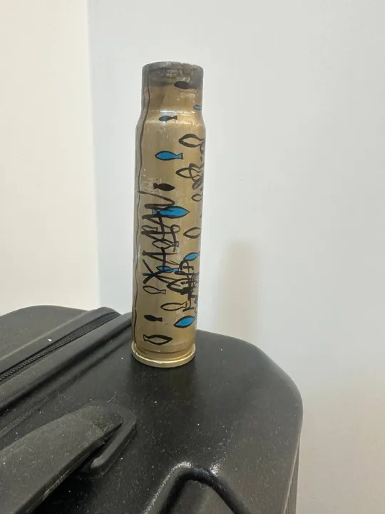 Унікальна гільза з підписами учасників групи Жадан і собаки Ціна