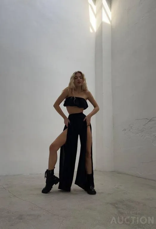 Купити Жіночий костюм двійка спідниця-брюки та топ колір чорний