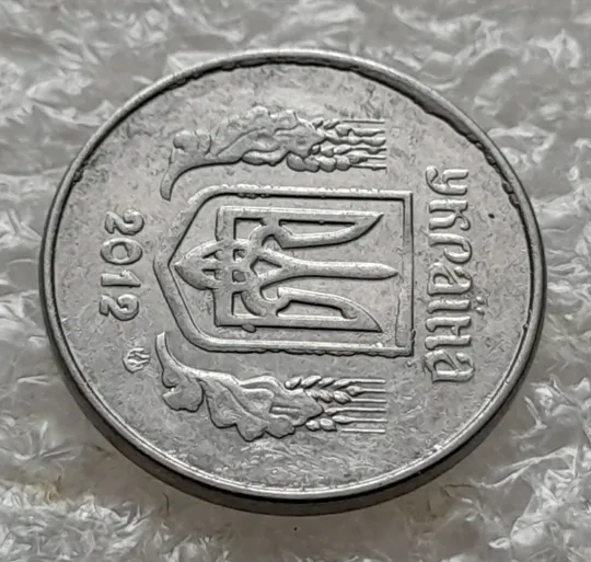 (5845) 1 копійка 2012 лишній метал на аверсі, викрошки (1 копейка 2012 брак крокодил) Де купити