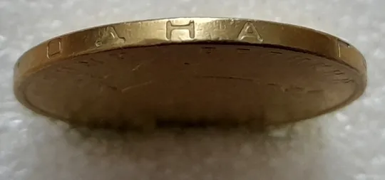 Купити (5393) 1 гривня 2005 невелика викрошка у букві "Н" слова "ОДНА" на гурті (1 гривна 2005 брак)