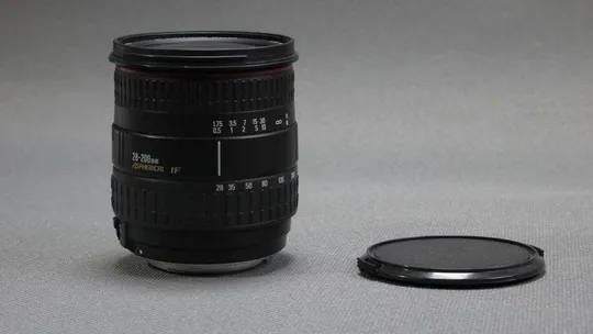 Canon EF телеобъектив Sigma 28-200 mm/3.5-5.6 DL Aspherical IF Macro MC Ф72mm Де купити