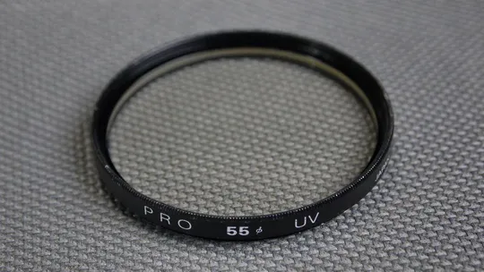 PRO UV 55мм. защитный ультрафиолетовый светофильтр 100% оригинал Japan Ціна
