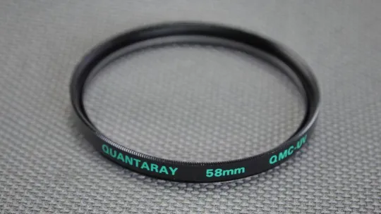 Купити Quantaray QMC-UV 58мм. защитный ультрафиолетовый светофильтр 100% оригинал Вживане
