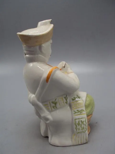 Штоф фарфор фигура бурят сидит на бочке с рогом высота 17 см №14208 Продаж