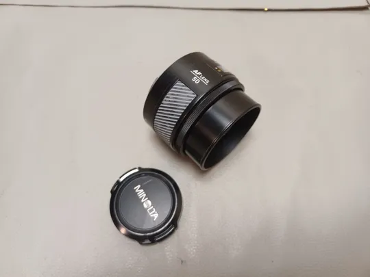 0412 світлосильний стандартний об'єктив із автофокусом  Minolta AF 50mm f/1.4 НІМЕЧЧИНА Де купити