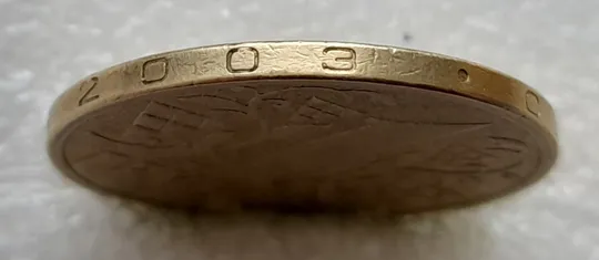 Купити (4684) 1 гривня 2003 вісім викрошок на гурті (див.опис) (1 гривна 2003 брак викрошка)