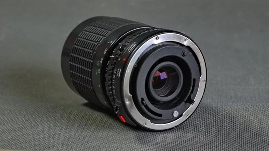 Купити Canon FD телеобъектив Sigma Zoom-KIV 70-210mm/4-5.6 MC Ф52мм для беззеркалок Sony, Olympus и др.