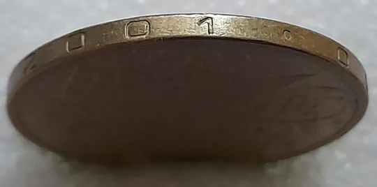 Купити (1854да) 1 гривня 2001 викрошки у букві "Г" слова "ГРИВНЯ" та цифрі "1" слова "2001" на гурті (1 гривна 2001 брак)