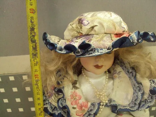 Купити Фарфоровая кукла девочка с сумкой №465п