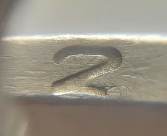 (4682) 1 гривня 2006 різновид викрошки у цифрі "2" слова "2006" на гурті (1 гривна 2006 брак) Ціна