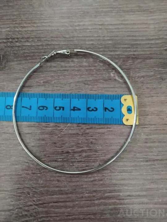 Великі сережки Де купити