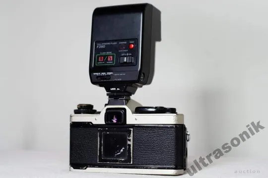 Купити пленочный фотоаппарат Olympus OM-4T + Zuiko 50mm/1.8 MC + вспышка T280