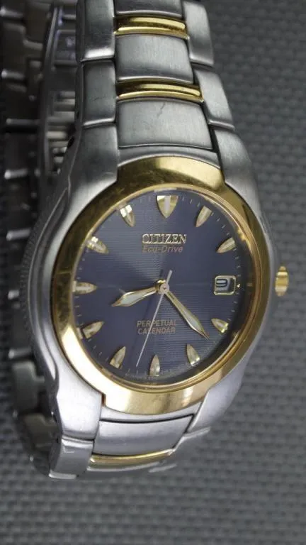 CITIZEN Eco-Drive Perpetual Calendar 100м. цельнолитая нержавейка синий циферблат model:E710-H24385T Продаж