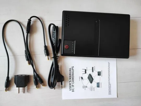 Джерело безперебійного живлення mini dc ups dc1018p 10400 mah 18w Інтернет-аукціон