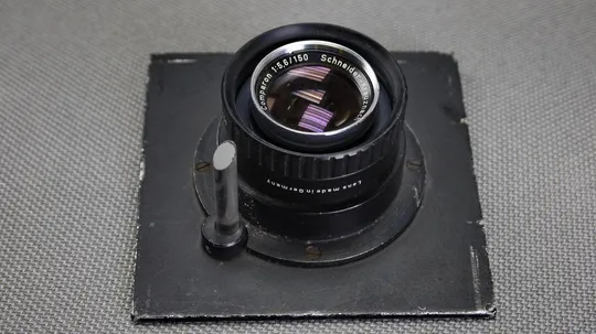 Schneider-Kreuznach Comparon 150mm/5,6 установленный на доску для карданных камер Вживане Де купити