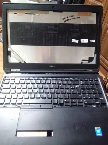фото, ноутбук  dell стан на фото.не включається. куплений на аукціоні з европи.