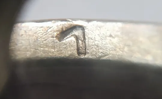 (1854да) 1 гривня 2001 викрошки у букві "Г" слова "ГРИВНЯ" та цифрі "1" слова "2001" на гурті (1 гривна 2001 брак) Ціна