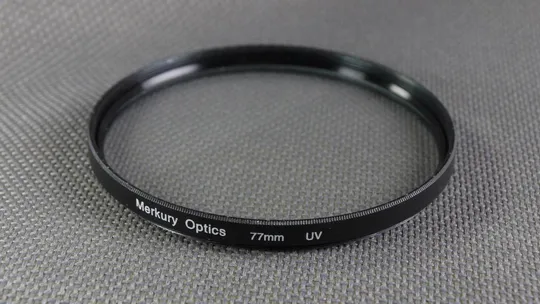 Купити Merkury Optics  (UV) 77мм. защитный ультрафиолетовый светофильтр 100% original Вживане