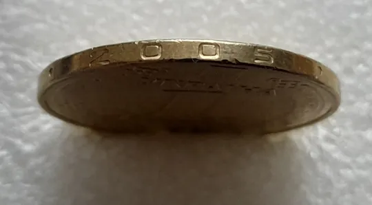 (8237) 1 гривня 2005 викрошка в букві "И" слова "ГРИВНЯ" на гурті (1 гривна 2005 брак викрошка) З аукціону