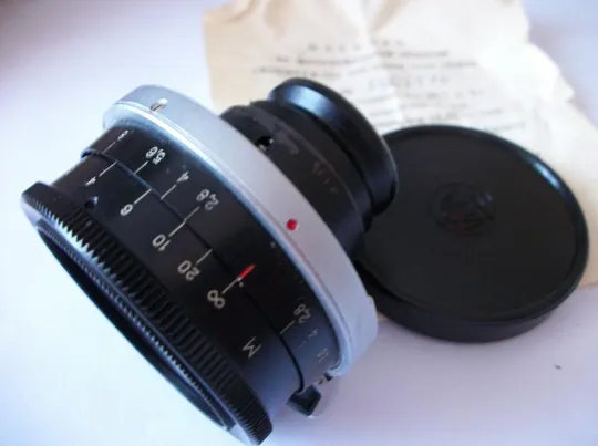 Объектив Юпитер-12 , байонет. Футляр, передняя крышка и паспорт. No-8406446 . Цена мин Продаж