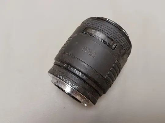 0565 об&#039;єктив  Sigma UC Zoom 70-210mm 1:4-5.6.  НІМЕЧЧИНА Продаж