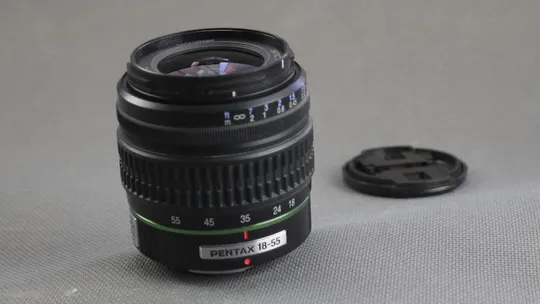 Об&#039;єктив SMC Pentax-DA AF 18-55mm 1:3.5-5.6 AL Ф52мм штатный зум для цифровыx камер Pentax Вживане Продаж