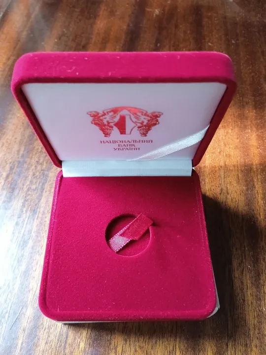 Футляр для золотої двух гривневої монети. Знаки зодіаку. Ціна