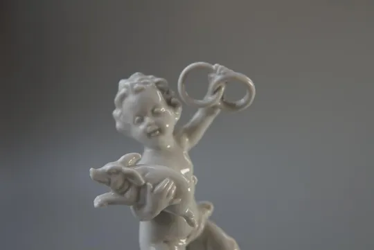 Фигура фарфор статуэтка Германия Wagner and Apel путти мальчик с поросенком свинкой 15,3 см №10052 Інтернет-аукціон