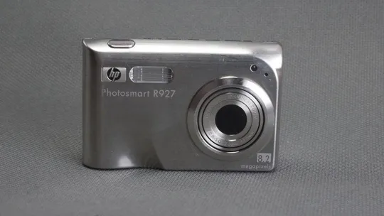 Металлический цифровой фотоаппарат HP Photosmart R927 8.2Mpix 7,5-22,5mm zoom lens Вживане Ціна