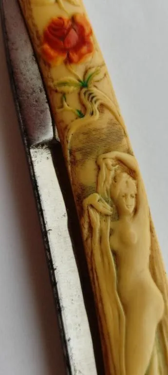 Антикварная бритва с сюжетом Ева и змей-искуситель nd753 З аукціону