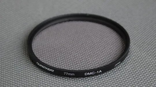 Купити Quantaray DMC-1A 77мм. защитный ультрафиолетовый светофильтр 100% оригинал Japan Вживане