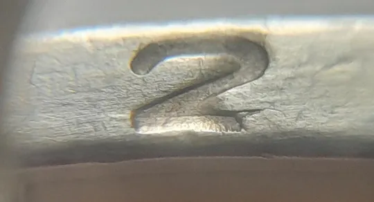 (4715) 1 гривня 2006 різновид викрошки у "2" слова "2006" на гурті + наплив металу (1 гривна 2006) Ціна