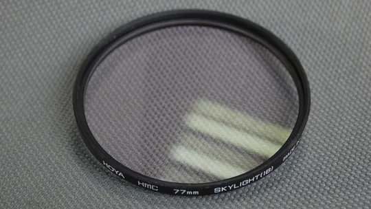 Hoya HMC Skylite 1A 77мм. защитный ультрафиолетовый светофильтр 100% оригинал Japan Ціна