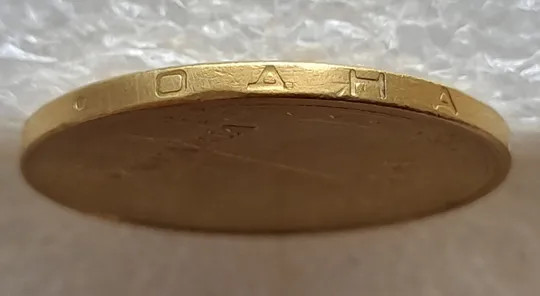 (6618) 1 гривня 2005 викрошки у букві "Д" слова "ОДНА" та у 'И' слова 'ГРИВНЯ' на гурті(1 гривна 2005 брак) Ціна