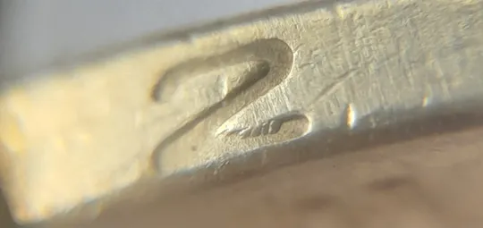 (5129) 1 гривня 2006 гарна викрошка внизу цифри "2" слова "2006" на гурті (1 гривна 2006 брак) Ціна