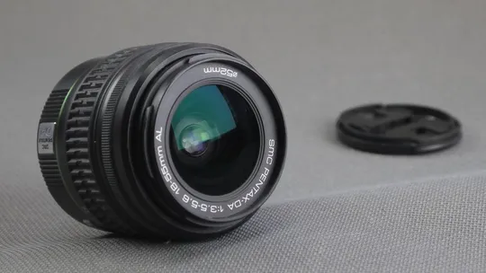 Об&#039;єктив SMC Pentax-DA AF 18-55mm 1:3.5-5.6 AL Ф52мм штатный зум для цифровыx камер Pentax Вживане Ціна