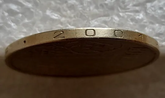 (7472) 1 гривня 2001 викрошка у букві "Д" слова "ОДНА" на гурті (1 гривна 2001 брак) Продаж