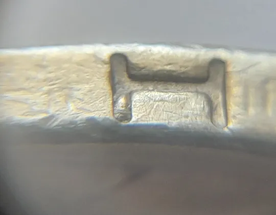 (5073) 1 гривня 2006 двійний удар на реверсі + викрошки вверху цифри "2" слова "2006" та у букві "Н" слова "ОДНА" на гурті (1 гривна 2006 брак) Ціна