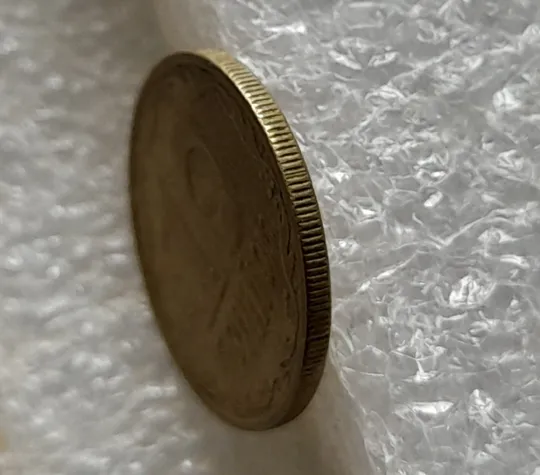 Купити (2033) 10 копійок 2002 брак гуртильного кільця на 4 год.(10 копеек 2002 брак гуртильного кольца)