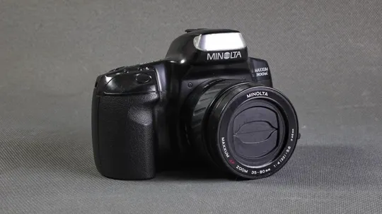 Купити пленочный фотоаппарат Minolta Maxxum 300si + зум объектив Minolta Maxxum AF 35-80/3.5-4.5 Ф46mm