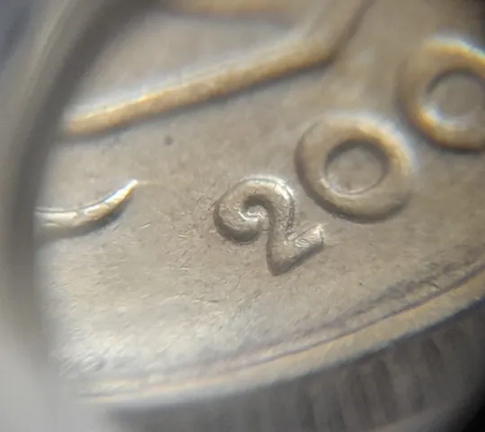 (1247) 10 копійок 2003 здвоєння елементів зображення на аверсі, двійний удар, зминання + круговий виробіток штампа (10 копеек 2003 брак) З аукціону