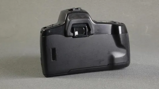 пленочный фотоаппарат Minolta Maxxum 300si + зум объектив Minolta Maxxum AF 35-80/3.5-4.5 Ф46mm Де купити