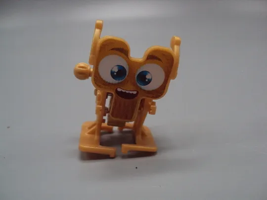 Фигурка киндер сюрприз VD203А Ferrero Robot Oro механический робот (заводится и ходит) №18606л Продаж