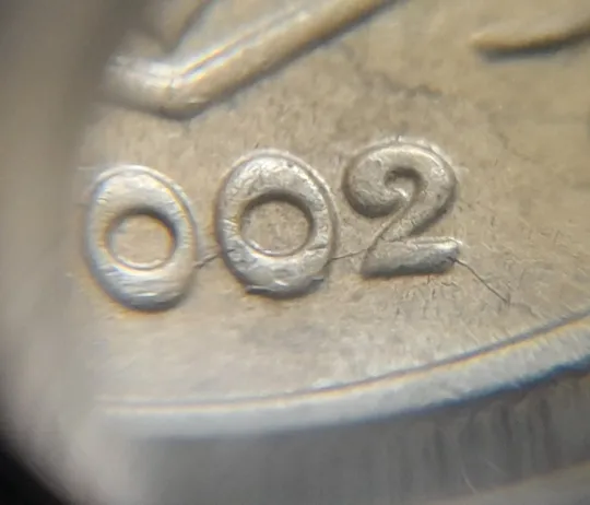 (1245) 10 копійок 2002 розкол у році випуску на аверсі (10 копеек 2002 брак) З аукціону