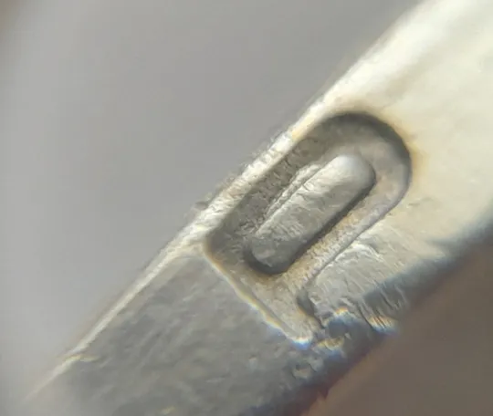 (6600) 1 гривня 2006 чотири викрошки на гурті : "2", "О", "Р", "И" (1 гривна 2006 брак) Продаж