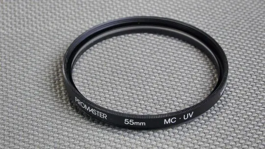 Купити ProMaster MC UV 55мм. защитный ультрафиолетовый светофильтр 100% оригинал Japan